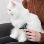 Гребінець-тріммер для собак та котів Trixie для видалення підшерстя 7 х 13,5 см-1